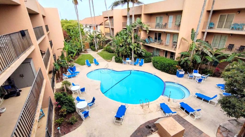 an overhead view of a swimming pool at a hotel at Beachview 103 Condominium Condo in South Padre Island