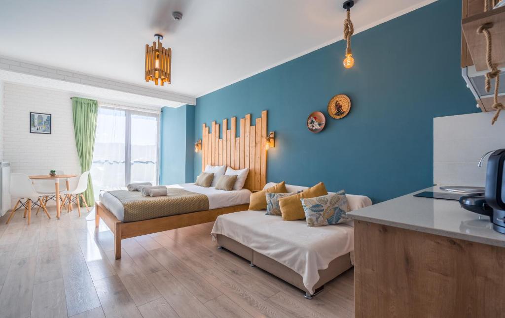 Posezení v ubytování New Gudauri Loft 2 Pines