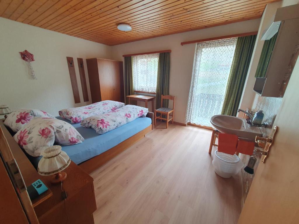 Postel nebo postele na pokoji v ubytování Plaun Grond