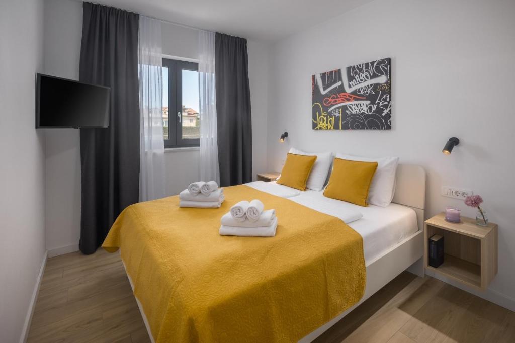 Postel nebo postele na pokoji v ubytování Lana Premium Residence