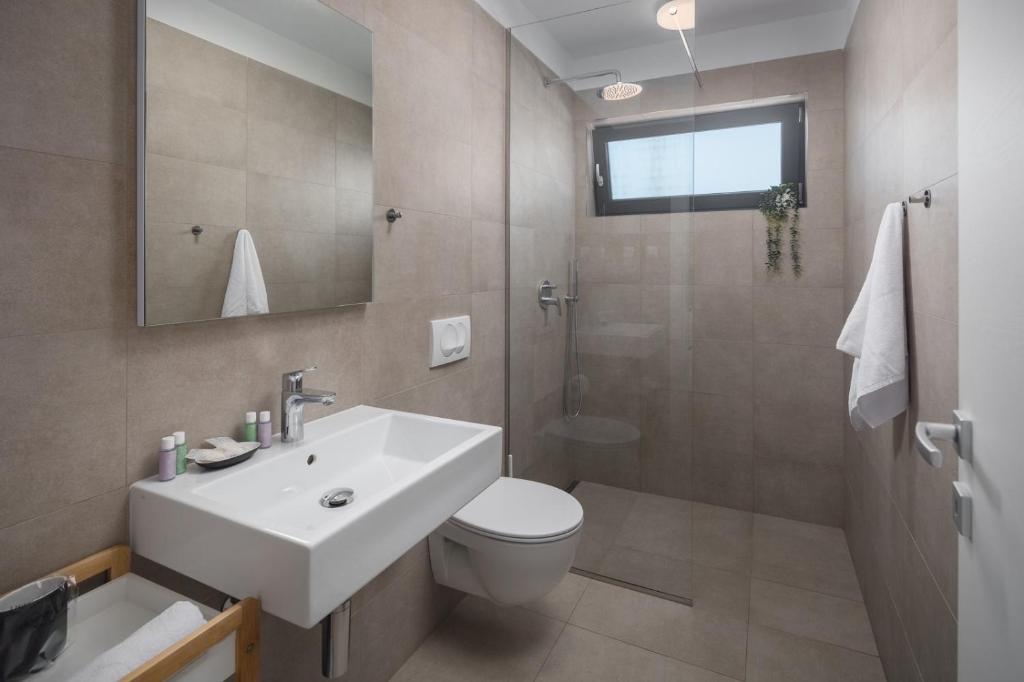 Koupelna v ubytování Lana Premium Residence