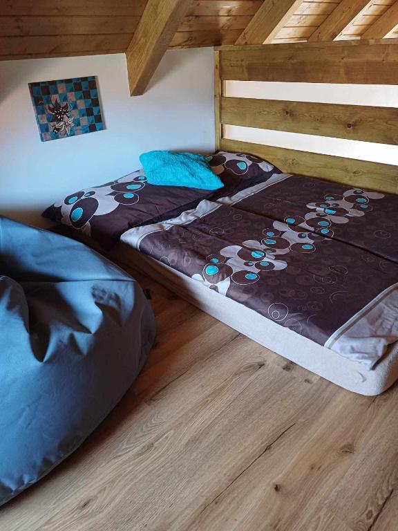 Postel nebo postele na pokoji v ubytování Apartmány Máchovo jezero
