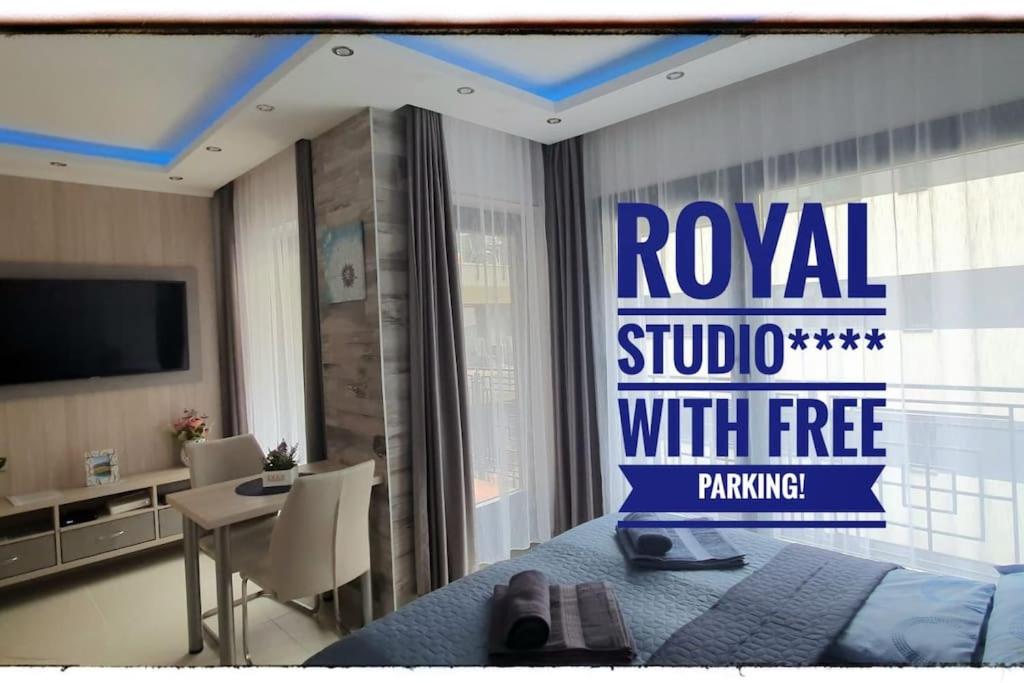 Hotel Márta&Géza premium apartment in the center of Budapest WITH FREE PARKING, a hotel room with a bed with a sign on it at Márta&Géza premium apartment in the center of Budapest WITH FREE PARKING in Budapest