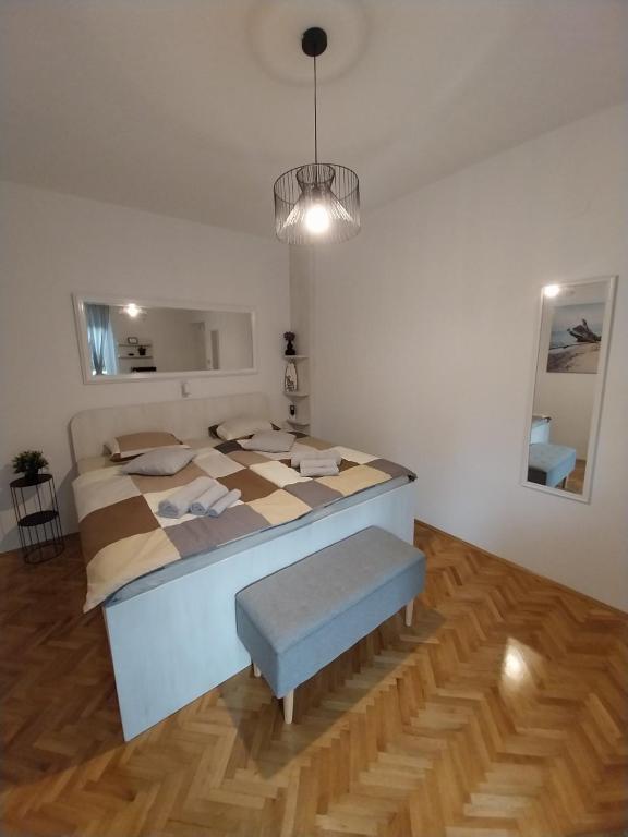Postel nebo postele na pokoji v ubytování SOBE ŠOTIĆ