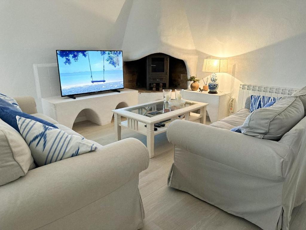 TV a/nebo společenská místnost v ubytování sa rapita paradise