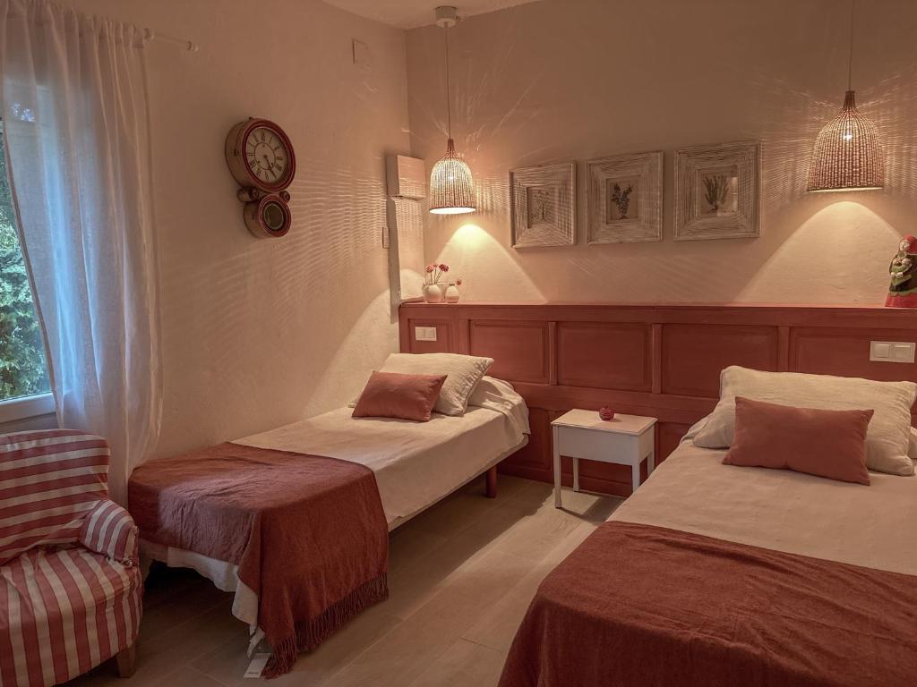 Postel nebo postele na pokoji v ubytování sa rapita paradise