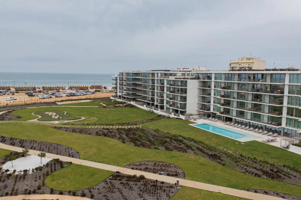 Πισίνα στο ή κοντά στο Bayline- Beachfront and Pool