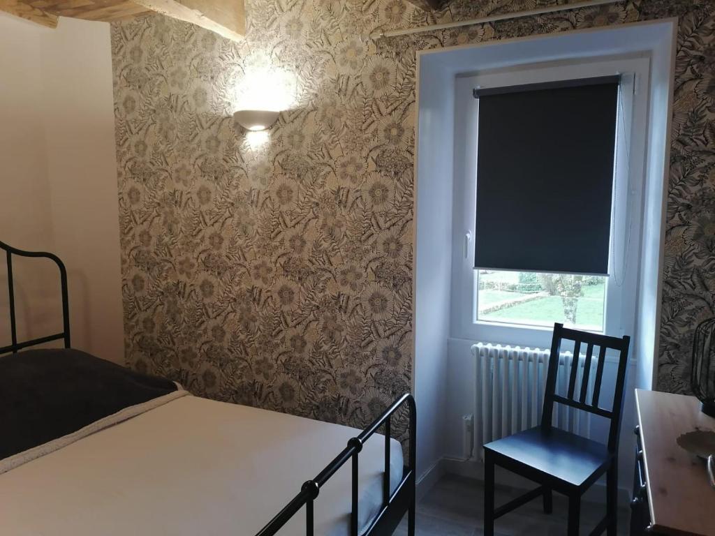 Postel nebo postele na pokoji v ubytování Gite Ti Maen