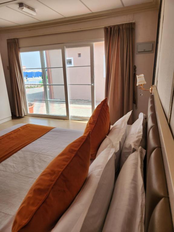 Postel nebo postele na pokoji v ubytování Lina Dreamland Resort