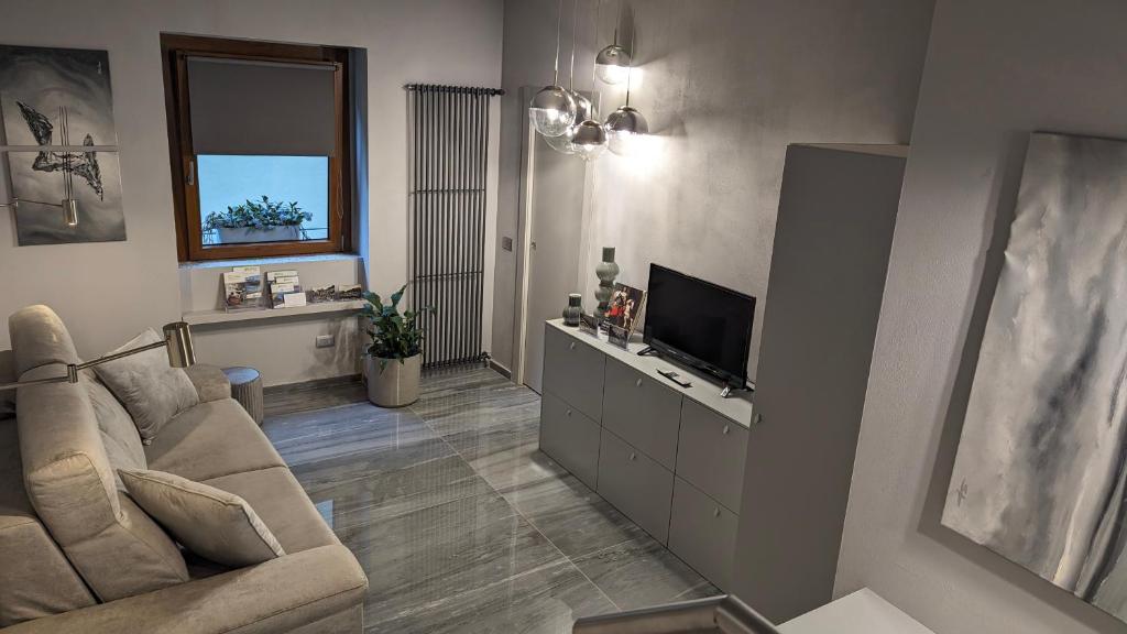 TV a/nebo společenská místnost v ubytování LA VIA DEL SALE accommodations holidays