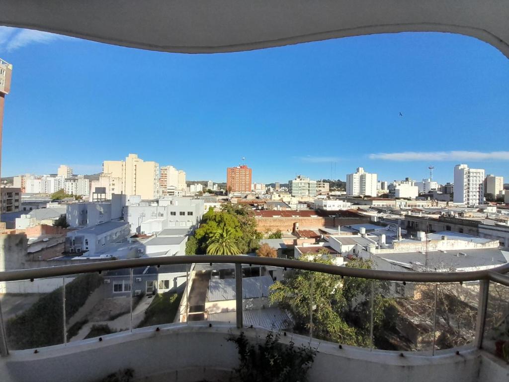 a view of a city from a balcony at Depto Martinez in Tandil
