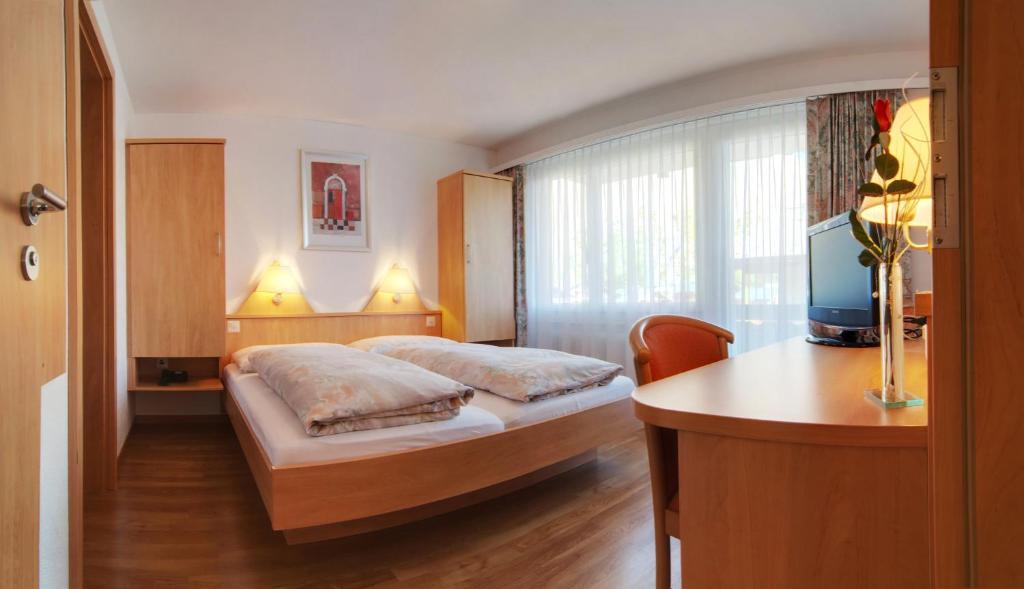 Postel nebo postele na pokoji v ubytování Hotel Eden No. 7