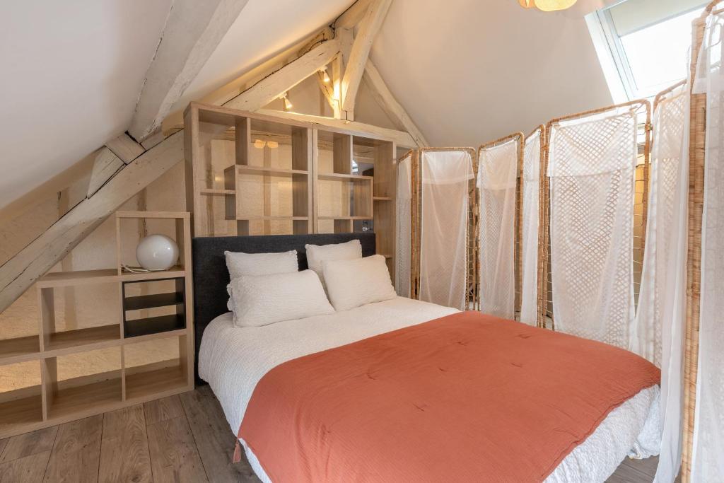 Posteľ alebo postele v izbe v ubytovaní Le Cottage de Chitenay