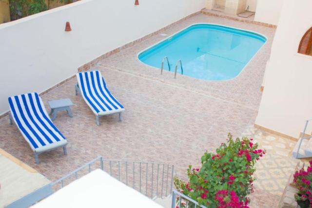 Bazén v ubytování Janat Elsahara Hotel nebo v jeho okolí