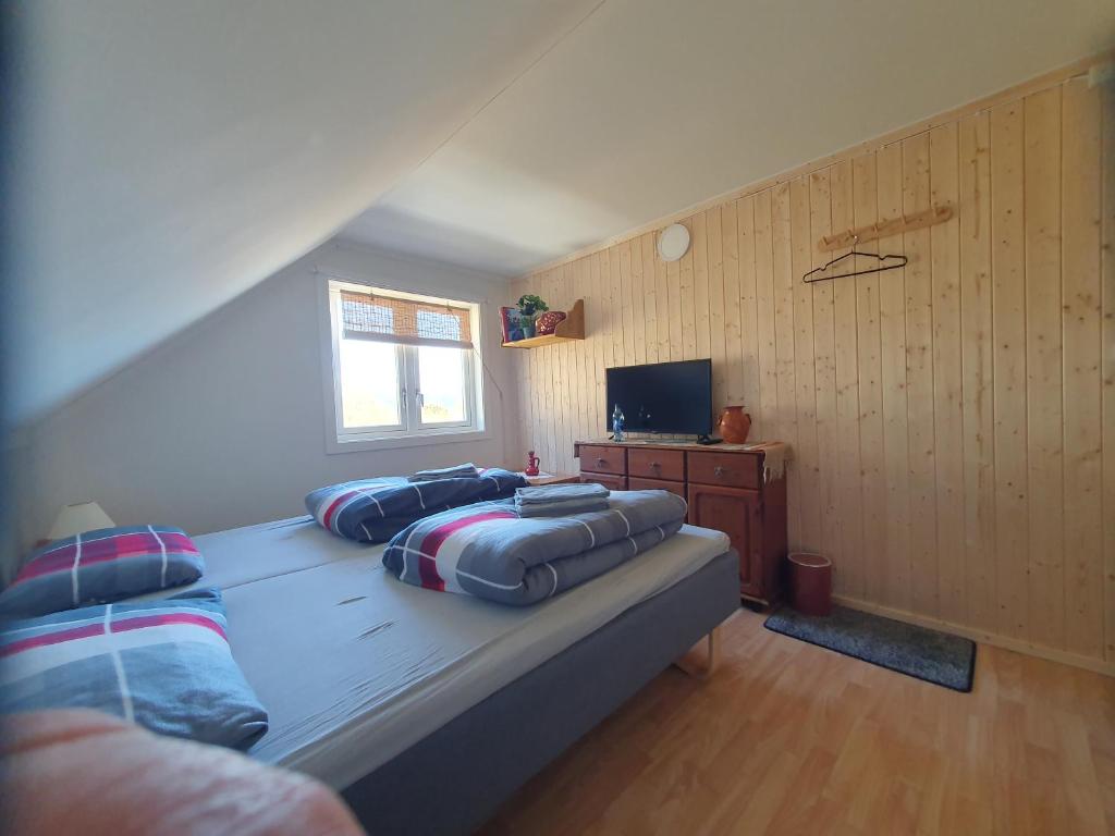 Postel nebo postele na pokoji v ubytování Overnatting Rodal