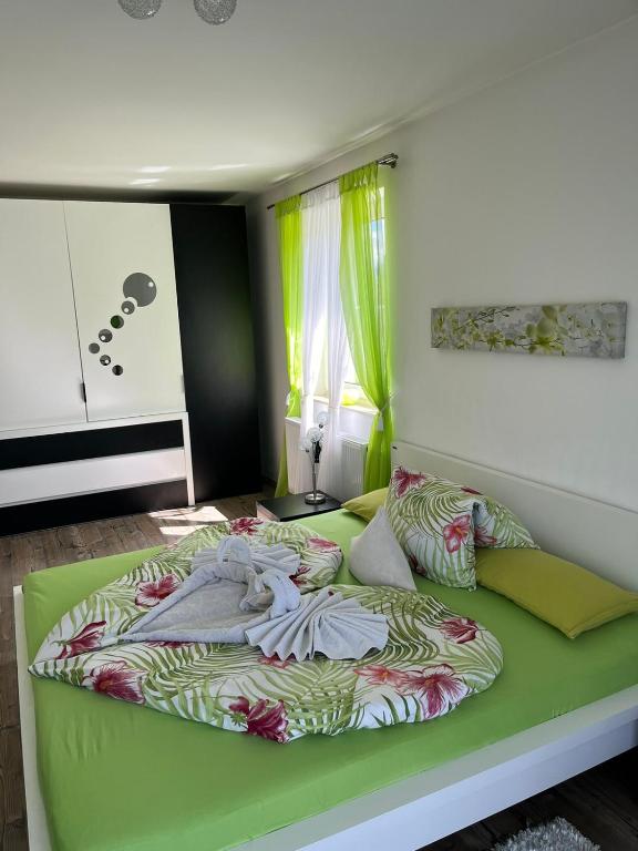 Postel nebo postele na pokoji v ubytování Charmantes Ferienhaus - Velden