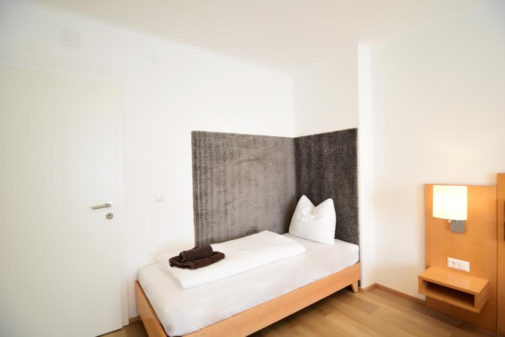 A bed or beds in a room at PM-APART Premstätten