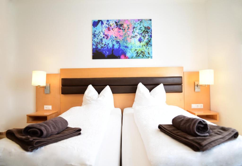 A bed or beds in a room at PM-APART Premstätten