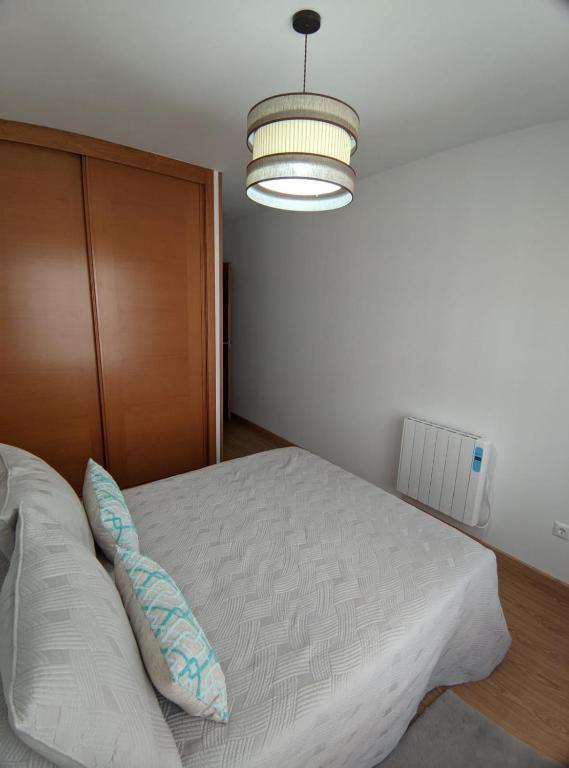 Postel nebo postele na pokoji v ubytování APARTAMENTO A CHILENA