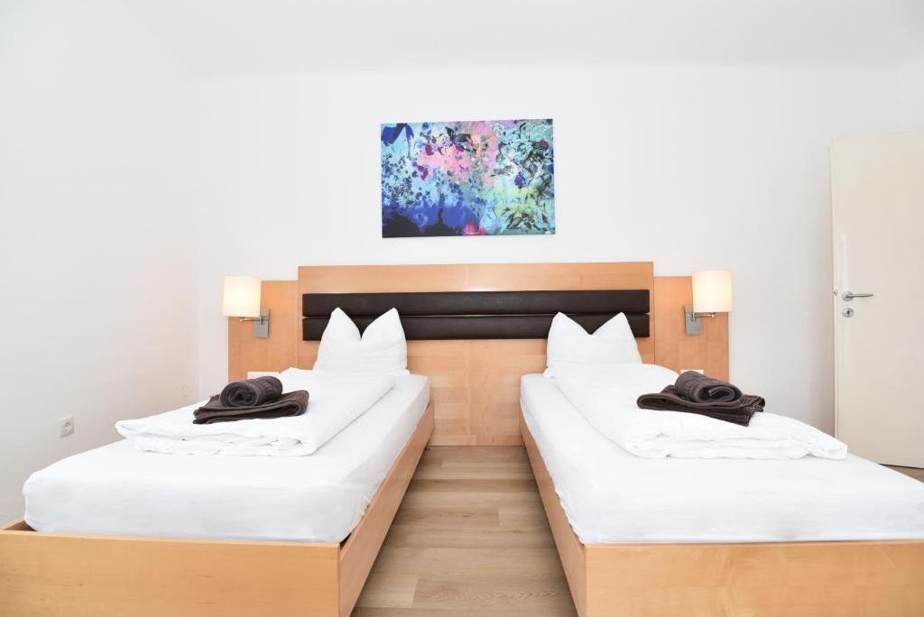 A bed or beds in a room at PM-APART Premstätten