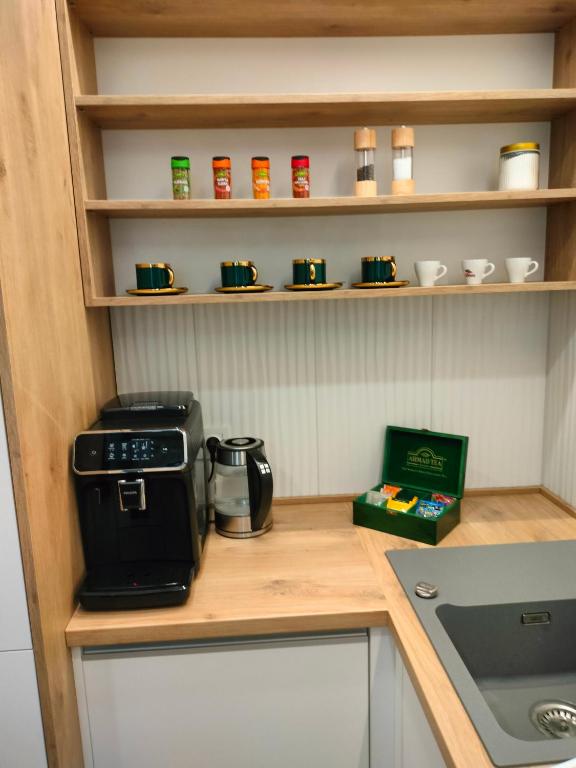 Kuchyň nebo kuchyňský kout v ubytování Apartament Paradise Zarządzany przez gospodarza osobę fizyczną Self check in