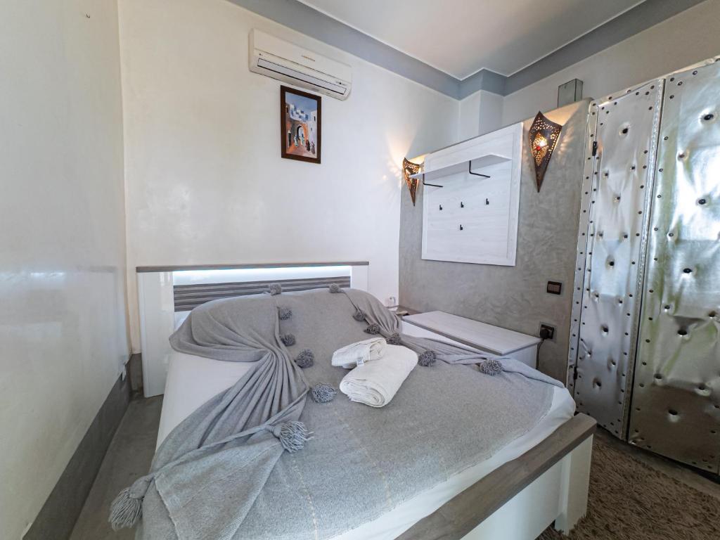 Postel nebo postele na pokoji v ubytování Riad Minorisa