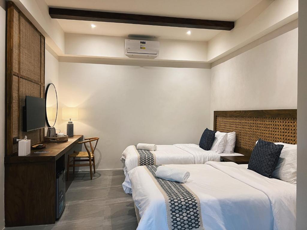 Postel nebo postele na pokoji v ubytování Sorana Island Villas