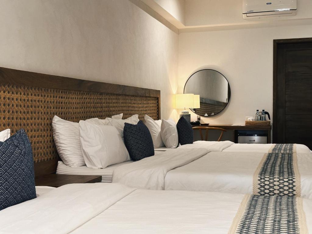Postel nebo postele na pokoji v ubytování Sorana Island Villas