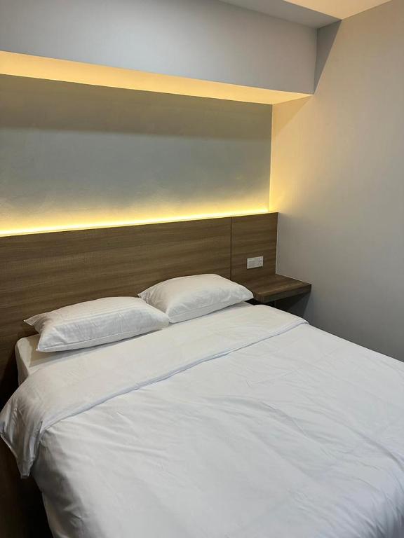 Postel nebo postele na pokoji v ubytování EpochHotel