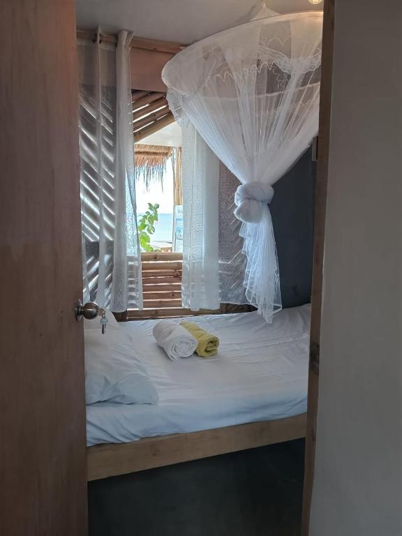 Postel nebo postele na pokoji v ubytování 8 Star Paradise