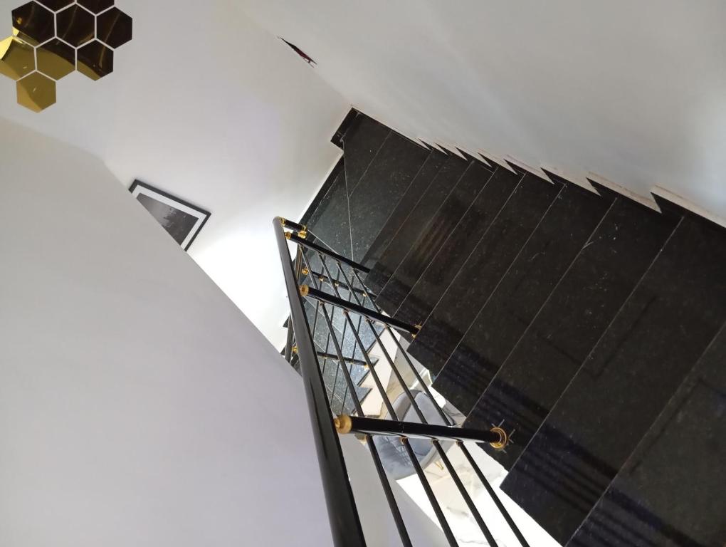 an overhead view of a staircase in a house at 3 Bedroom Luxury Duplex (terrace) in Enugu