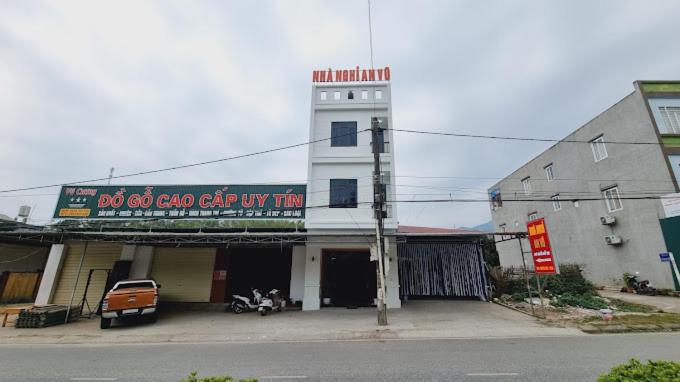 a building with a sign that reads old crab car city tun at Nhà nghỉ An Vũ Hotel cơ sở 2 in Bak Kan