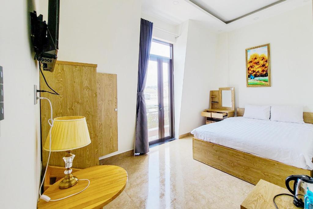 Giường trong phòng chung tại Mai DiaMond Hotel