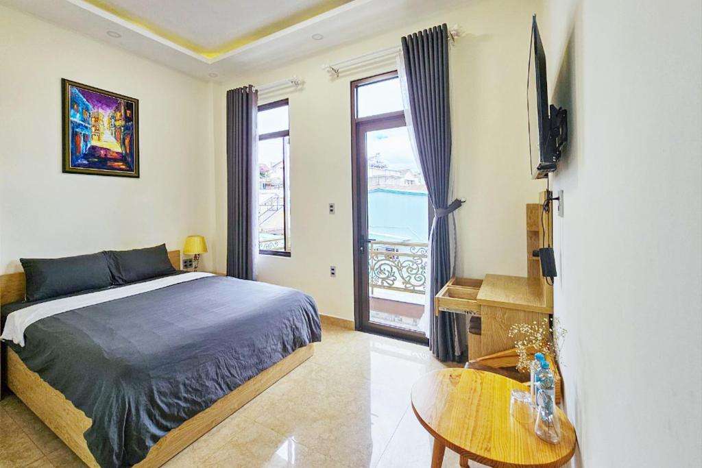 Giường trong phòng chung tại Mai DiaMond Hotel