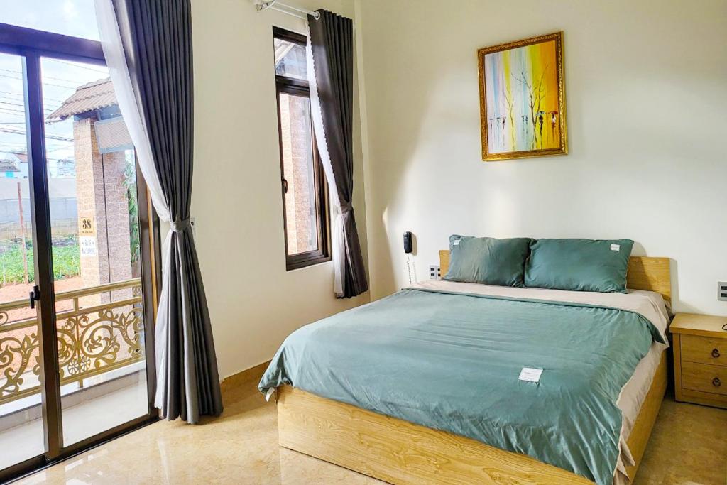 Giường trong phòng chung tại Mai DiaMond Hotel
