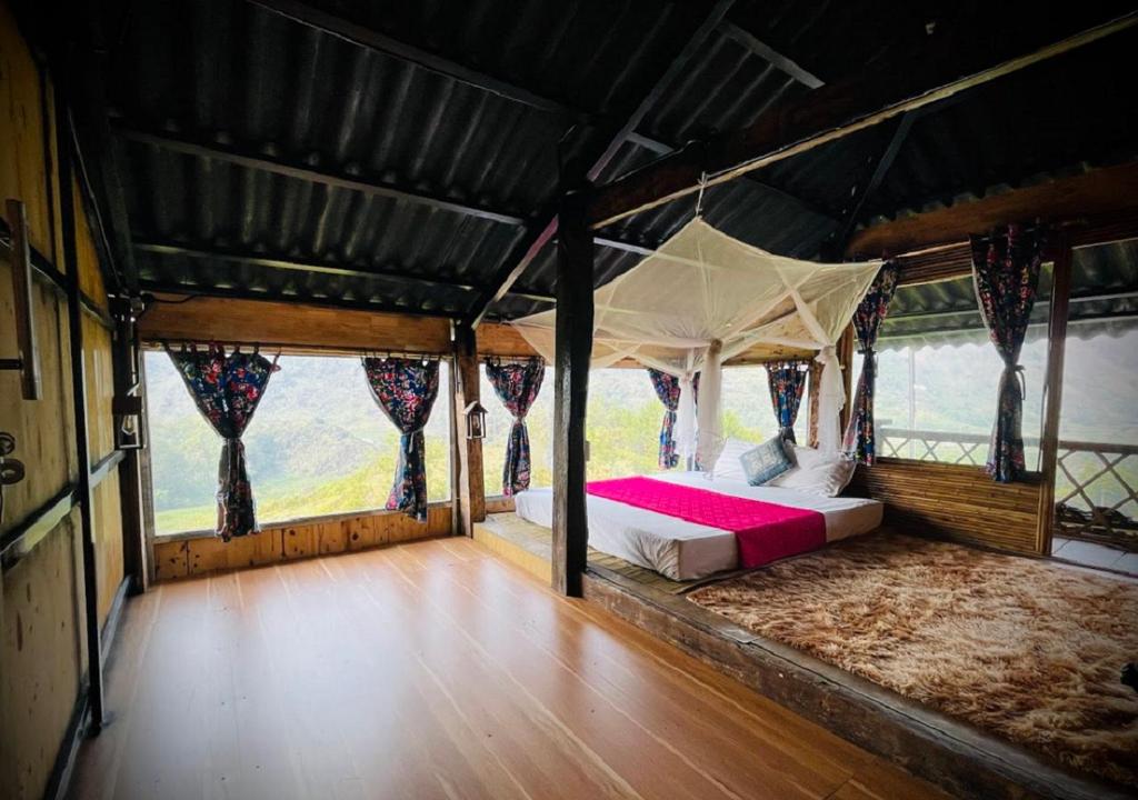 Postel nebo postele na pokoji v ubytování Du Gia Panorama Ecologde
