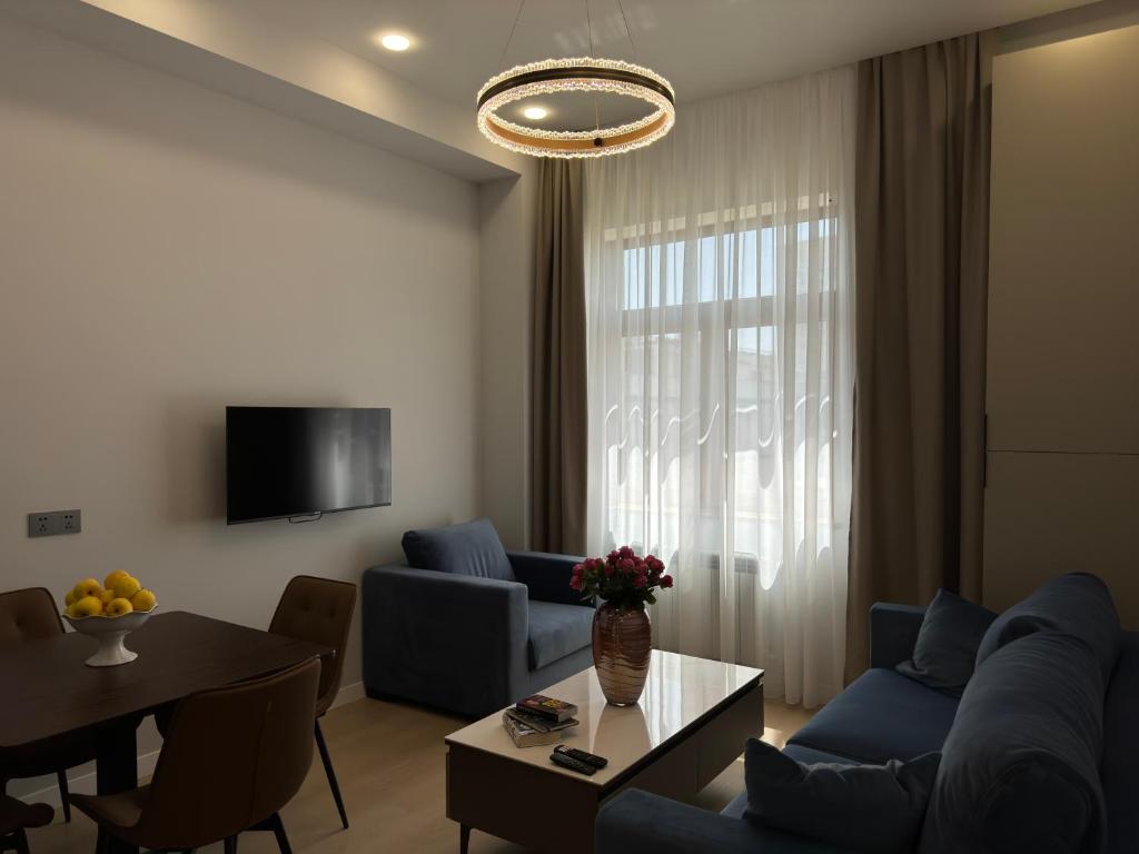 TV a/nebo společenská místnost v ubytování GS Premium