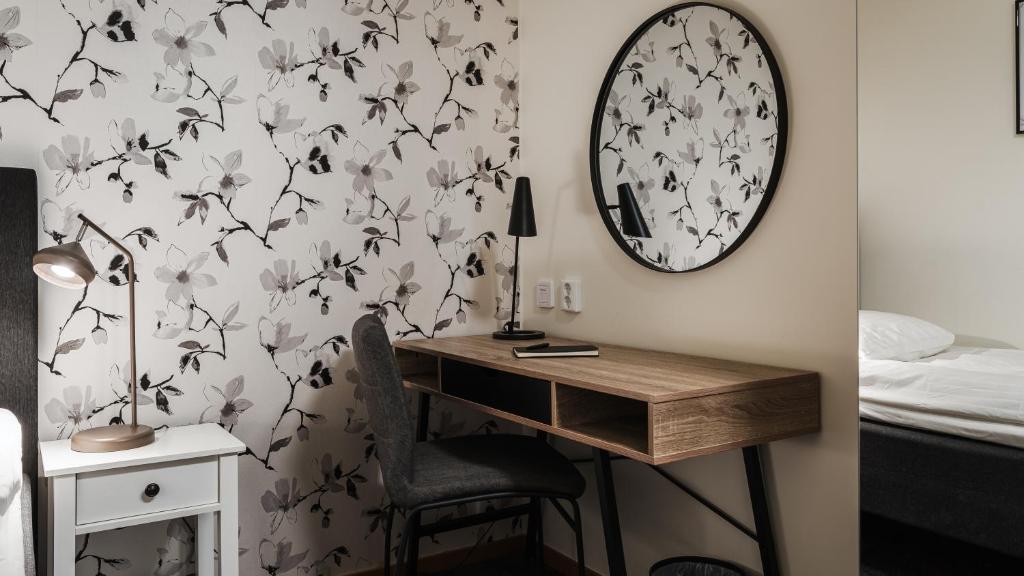 Postel nebo postele na pokoji v ubytování Comfort Hotel Skellefteå