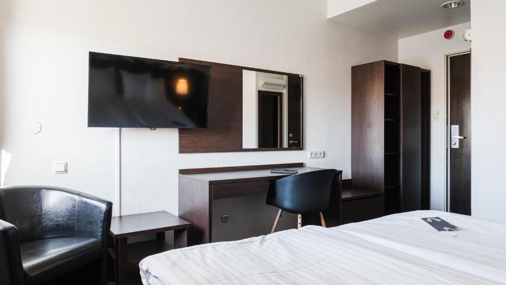 TV a/nebo společenská místnost v ubytování Comfort Hotel Skellefteå