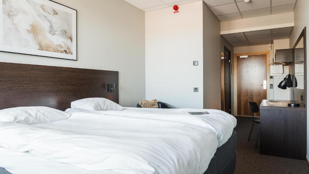 Postel nebo postele na pokoji v ubytování Comfort Hotel Skellefteå