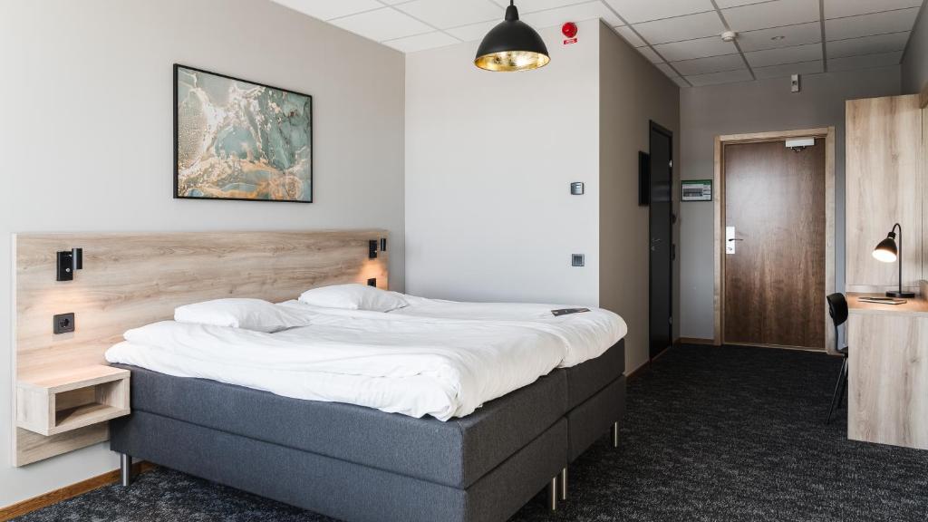 Postel nebo postele na pokoji v ubytování Comfort Hotel Skellefteå