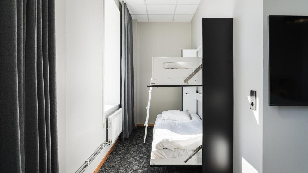 Postel nebo postele na pokoji v ubytování Comfort Hotel Skellefteå