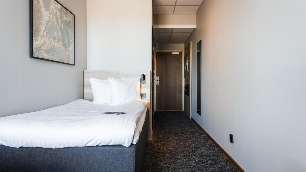 Postel nebo postele na pokoji v ubytování Comfort Hotel Skellefteå
