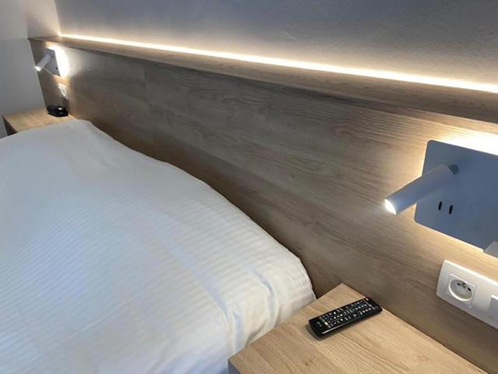 Postel nebo postele na pokoji v ubytování Hotel Louisa