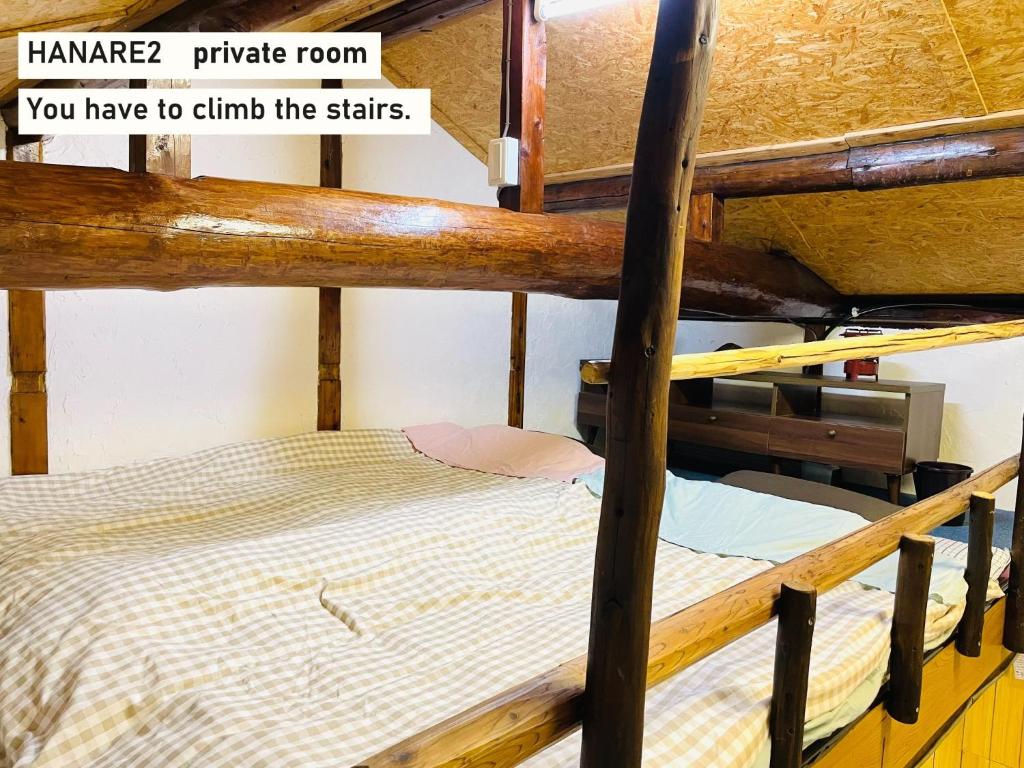 a couple of bunk beds in a room at TAKIO Guesthouse - Vacation STAY 12542v in Higashi-osaka
