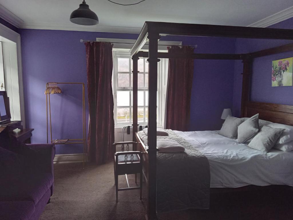 Postel nebo postele na pokoji v ubytování Lime Tree Hotel