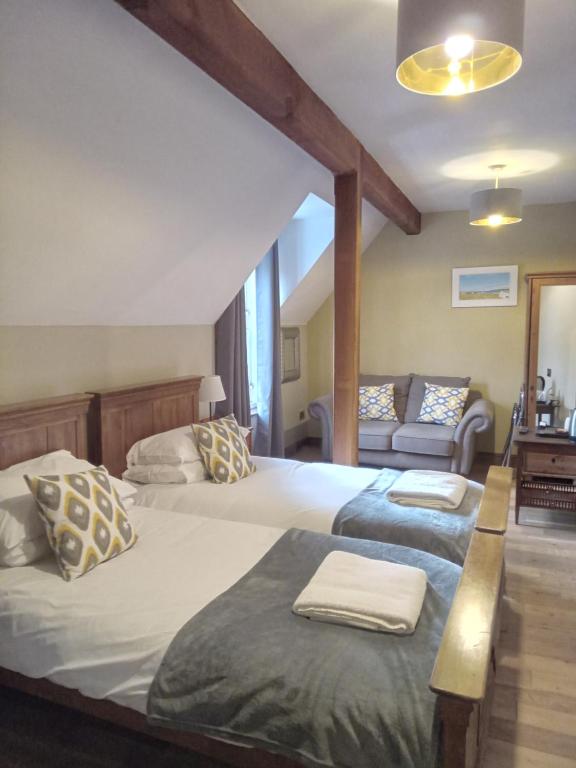 Postel nebo postele na pokoji v ubytování Lime Tree Hotel