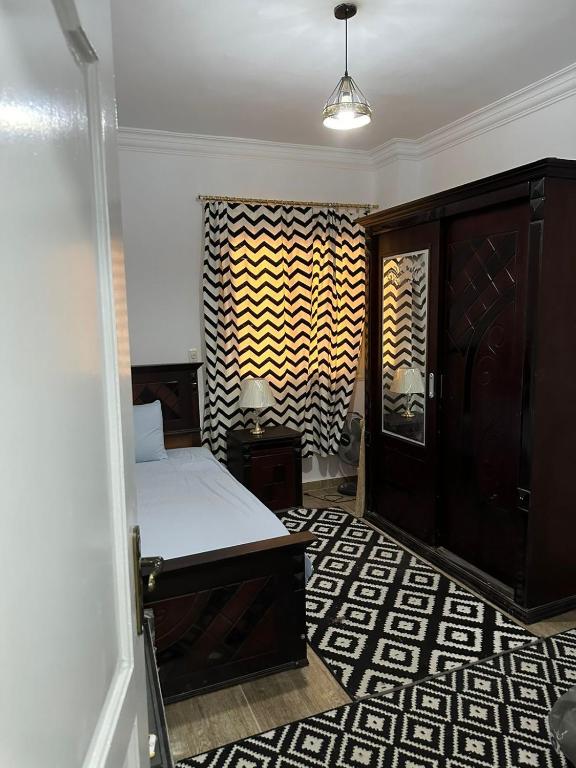 Postel nebo postele na pokoji v ubytování Quite apartment with positive vibes