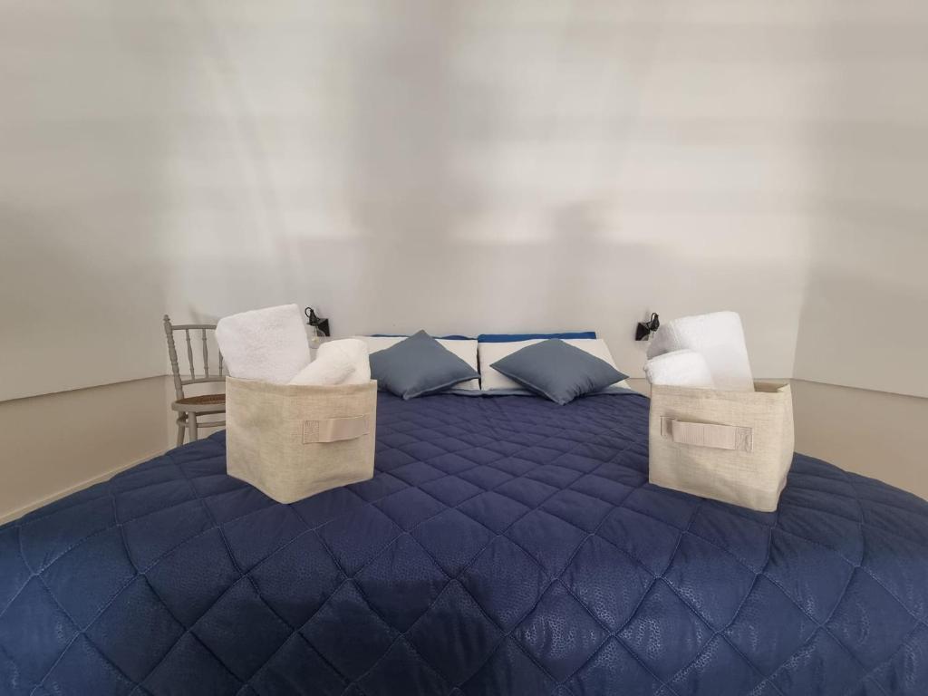 Postel nebo postele na pokoji v ubytování Carrube Apartments