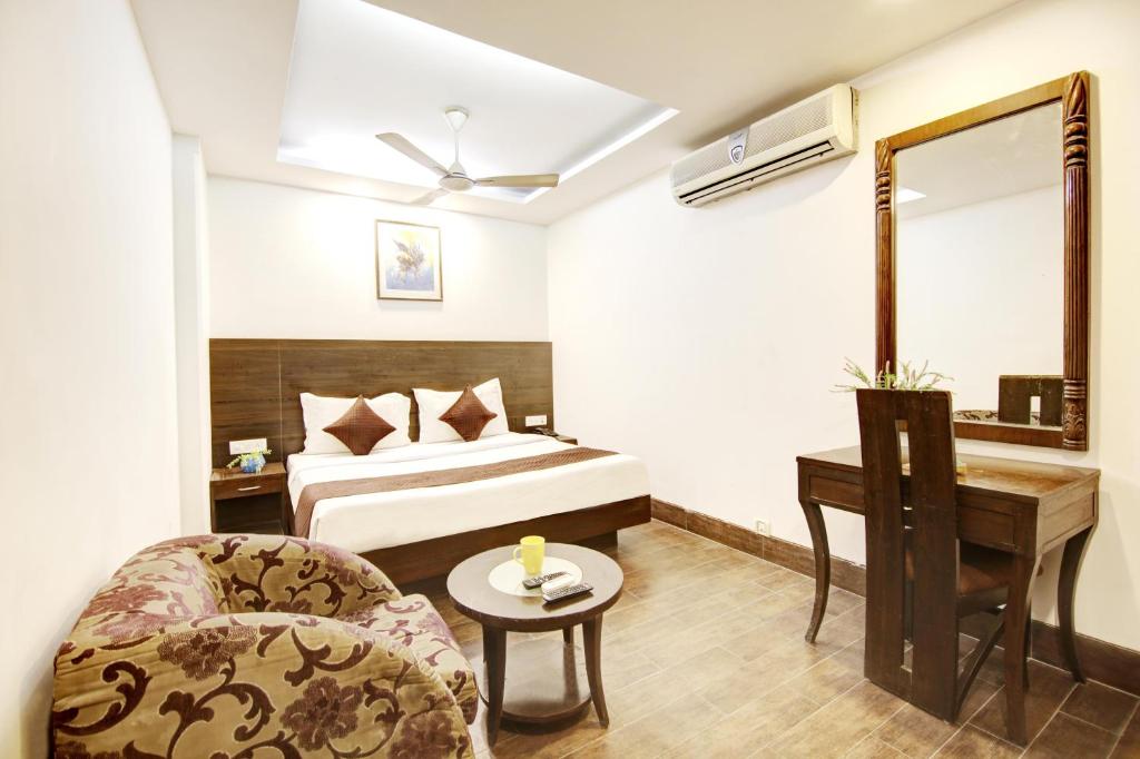 Postel nebo postele na pokoji v ubytování Hotel Good Times New Delhi